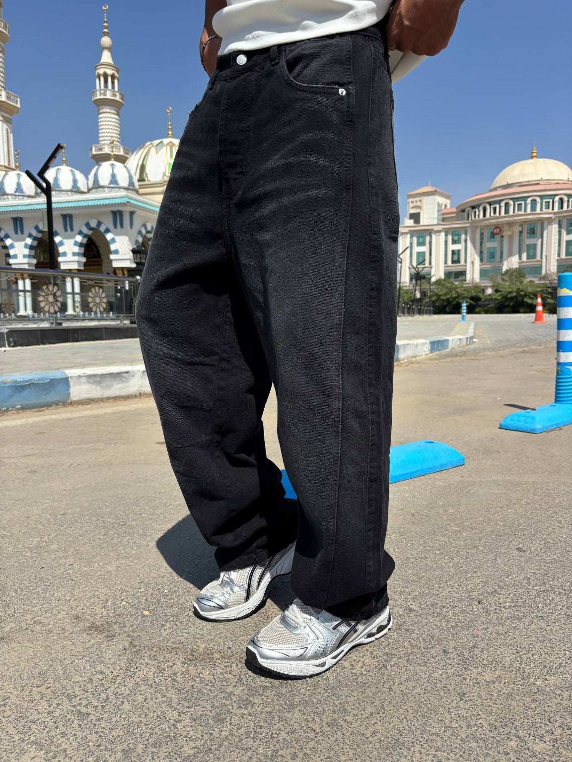 Black balloon jeans — angled view