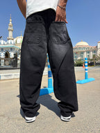 Black balloon jeans — back view
